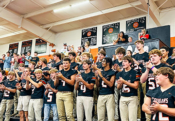 Group of spirited students in the gym