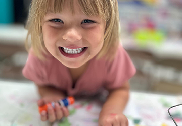 Closeup of little girl smiling for the camera