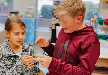 Two students doing group project